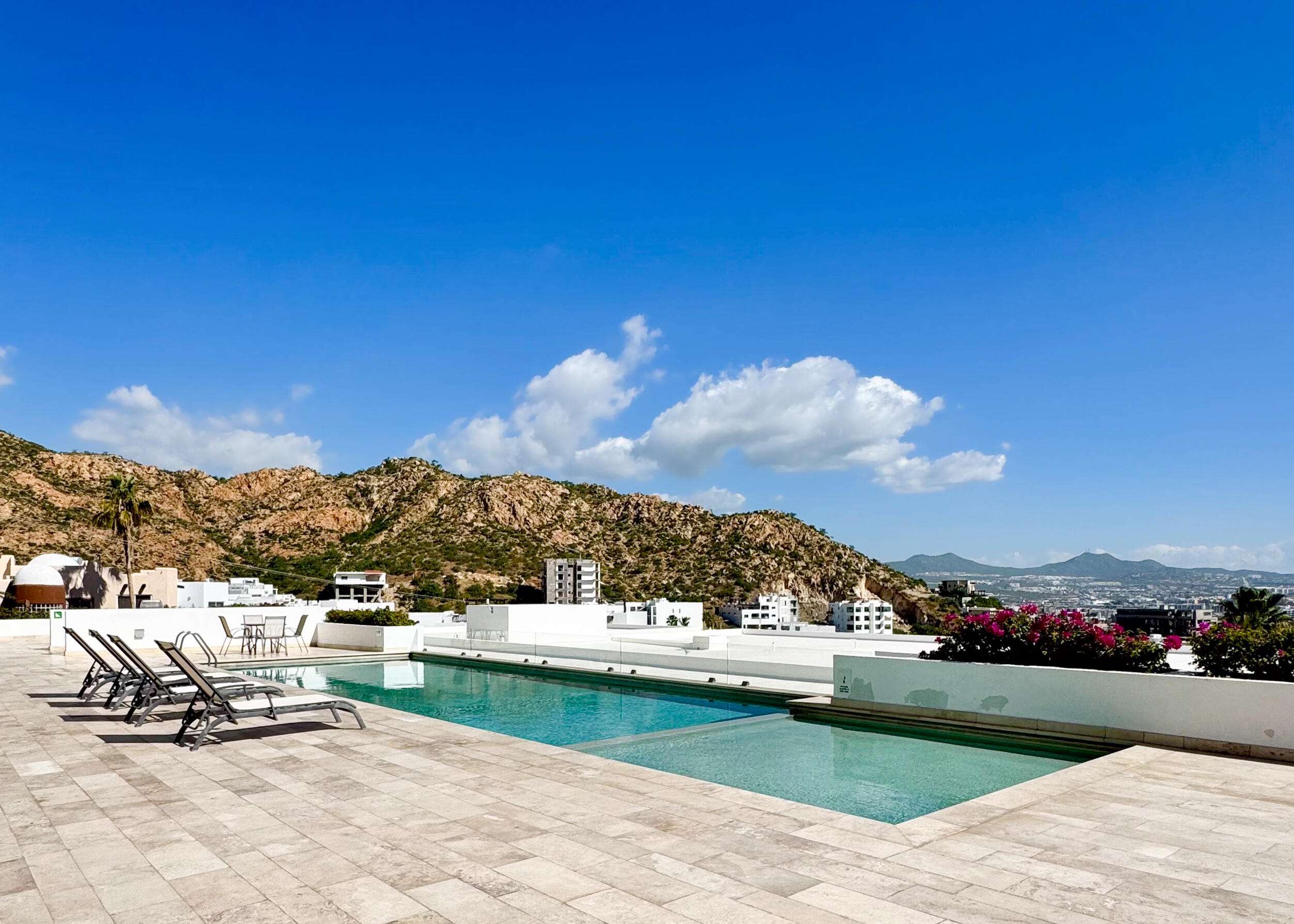 Los Cabos Tortuga Bay COMFORTABLE BEACHFRONT CONDO Location is everything at San Jose´s TORTUGA BAY. The 1st phase of this exclusive enclave is comprised of 33 luxury condos in two BEACHFRONT buildings. Modern, 2nd floor, 2BD/ 2BA with a spacious 2077 sq ft floor plan that defines open spaces. Vibrant RENOVATED kitchen w/ Viking gas stove & Sub-Zero Fridge, wine cooler, white cabinetry. Pocket doors open indoors out to the covered patio with amazing ocean for sale