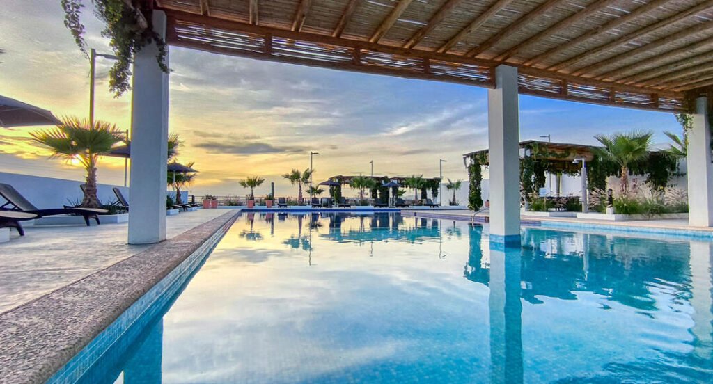 Los Cabos Idaho Condos Bright, spacious 2-bed, 2-bath condo, freshly updated with paint, updated cabinets, and quartz countertops. This stylish, move-in-ready home features a private patio just steps from a beautifully landscaped pool, plus access to the shared rooftop terrace with sweeping ocean – 247 Mar de Cortez, Cabo Corridor, BS