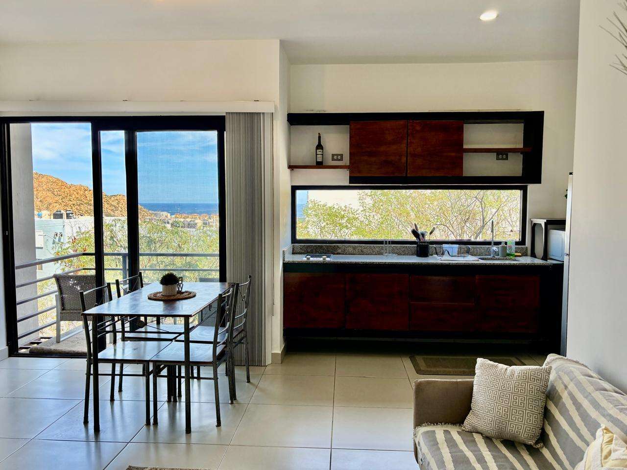 Los Cabos Breeze Of Cabo Discover the charm of Ground Floor Unit #103 at Breeze of Cabo, located in the sought-after Sunset area of Cabo San Lucas.This modern 2-bedroom, 2-bathroom condo features a spacious private patio — perfect for enjoying the warm weather and outdoor living. , the unit includes underground parking and access to a shared rooftop with a swimming pool and panoramic ocean for sale