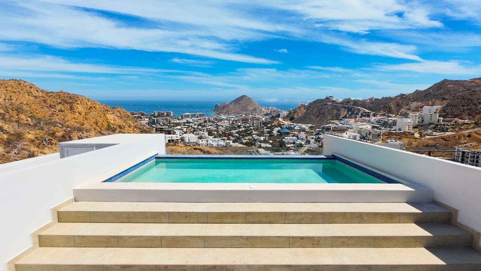 Los Cabos Breeze Of Cabo Discover the charm of Ground Floor Unit #103 at Breeze of Cabo, located in the sought-after Sunset area of Cabo San Lucas.This modern 2-bedroom, 2-bathroom condo features a spacious private patio — perfect for enjoying the warm weather and outdoor living. , the unit includes underground parking and access to a shared rooftop with a swimming pool and panoramic ocean for sale