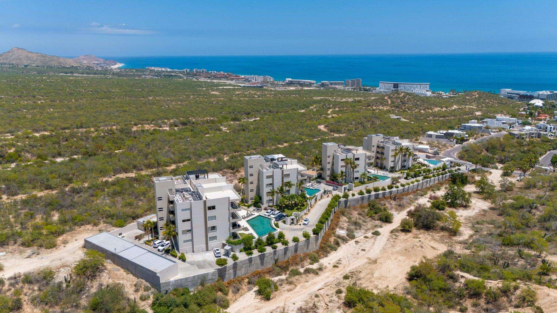 Los Cabos Paramo Páramo Village is a boutique residential community in San José del Cabo. This two-bedroom, two-and-a-half-bathroom residence combines comfort, style, and convenience within a secure, master-planned setting. Open-concept living with refined finishes and expansive for sale