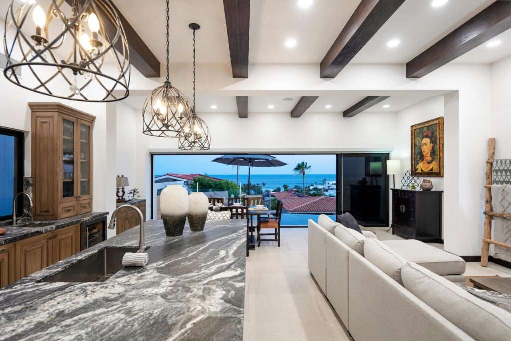 Los Cabos Palmilla Estates Discover a standout investment opportunity in coveted Palmilla Estates, where relaxed coastal style meets refined comfort. This single-story 3-bedroom, 3-bath home blends natural stone, warm wood beams, and a gourmet kitchen with high-end appliances, breakfast nook, and full bar. A generous entry courtyard opens to a heated pool, jacuzzi, outdoor kitchen, and a sun-washed yard overlooking the 9th fairway of the Jack Nicklaus Mountain Course. Eligible for a golf membership, it also makes an effortless vacation retreat with close access to Palmilla Beach, world-class amenities, and the charming San José town center. – Camino de la Duna, Cabo San Lucas, BS