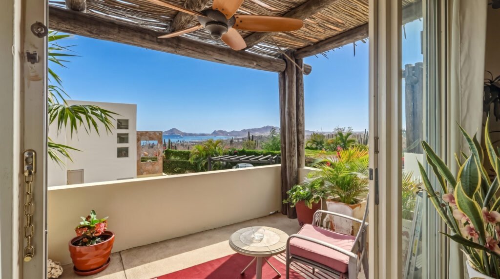 Los Cabos Casa Mex-Agaves Situated within the Casa Mexicana - Agaves community, this thoughtfully designed three-bedroom residence offers a functional and well-planned layout. The main level features a bedroom with an en-suite bathroom and walk-in closet, ideal for guests, multigenerational living, or those seeking stair-free access.A spacious outdoor terrace on the first floor, surrounded by tropical landscaping, provides a serene setting for both relaxation and entertaining. With multiple seating areas, it stands out as a unique feature within Casa Mexicana. The upper level includes two additional bedrooms, each with en-suite bathrooms and walk-in closets, along with the home's main living and kitchen areas. The indoor spaces are seamlessly connected to an additional terrace, enhancing the home's indoor-outdoor living appeal.Additional features include a dedicated laundry area, a two-car garage, and accordion-style hurricane shutters, combining comfort with practicality and peace of mind. – H3 Ave Punta arena, Cabo Corridor, BS