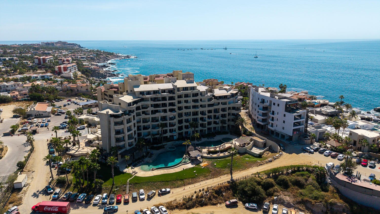 Los Cabos Marea Los Cabos Located in the exclusive Marea development, this 1,480 sq. ft. condo offers the premier downtown Cabo San Lucas lifestyle just 500 meters from Medano Beach. The contemporary, open-concept design features three spacious bedrooms--each with its own private balcony--and floor-to-ceiling windows that flood the sleek, white-cabinetry kitchen and living areas with natural light. This turnkey property is a lucrative opportunity for investors, coming fully furnished, equipped, and ready for immediate rental income with no renovations required. Residents enjoy premium community amenities, including 24/7 security, a lobby, a gym, and a sparkling pool. The standout rooftop terrace, with a jacuzzi , provides the perfect vantage point to take in the city for sale