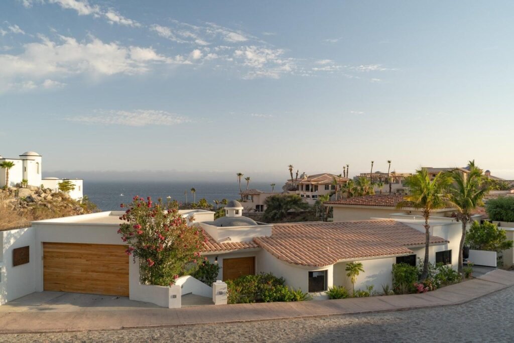 Los Cabos Cabo Colorado Discover modern luxury in this exquisitely designed home, built in 2020 and nestled within the exclusive, beachfront, private gated community of Cabo Colorado in San José del Cabo—just 2 miles from Palmilla Beach. Enjoy the convenience of living just steps from a stunning, sandy private beach within the community.With a striking contemporary aesthetic, this residence features gleaming white marble floors, beautifully appointed marble bathrooms, and captivating ocean – Seller Financing!, Cabo Corridor, BS