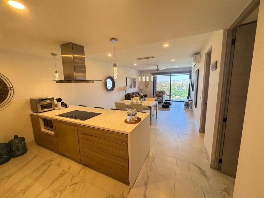 Los Cabos Amaterra Discover elevated living at Amaterra 602A, a stylish turnkey penthouse in the heart of the Cabo San Lucas corridor. Located just a 5-minute walk from the beach, this fully furnished 2-bedroom, 2-bath residence offers comfort, convenience, and excellent Airbnb potential. Positioned on the 6th floor, the condo features modern finishes, mini-split A/C, ceiling fans, and a bright open layout with city – SN UNIDAD PRIVATIVA A37, Cabo Corridor, BS