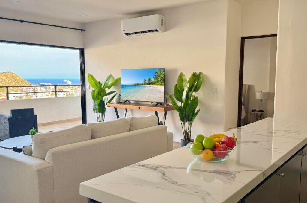 Los Cabos Luxotica Ii Luxotica delivers easy Cabo living in the Sunset area—close to the marina, restaurants, shopping, and beaches. This bright 2 bed / 2 bath third-floor condo comes fully furnished and equipped, ready to move in or rent immediately. Strong rental history makes it ideal for investors, seasonal owners, or full-time living. The unit includes private parking, plus access to a shared rooftop with panoramic – Sunset CSL Turn-Key, Cabo San Lucas, BS
