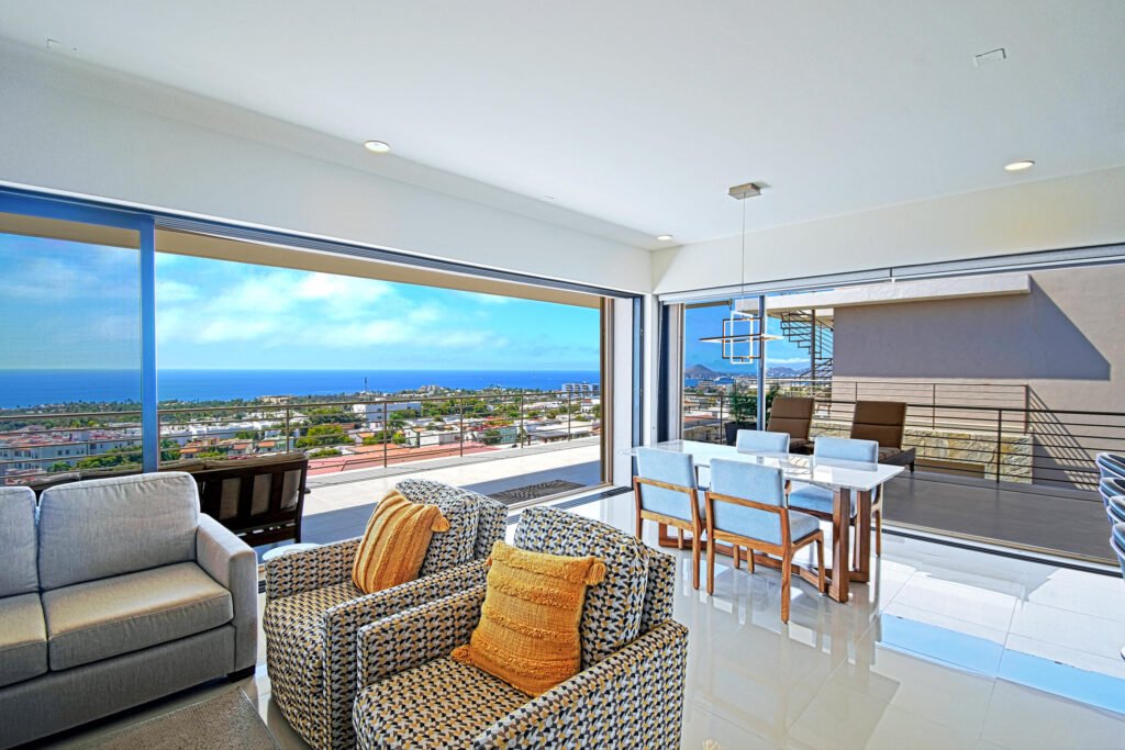 Los Cabos Casa Nima The crown jewel of Casa Nima, this extraordinary penthouse is the only one on its floor, offering absolute privacy with private elevator access and no neighboring units. Designed entirely on one level, it features 4 bedrooms and 4 full bathrooms, where refined living meets effortless flow.The open-concept living area extends onto a generous terrace, framing breathtaking – Tramonti PH A401, Cabo Corridor, BS