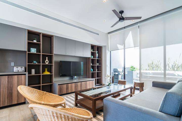 Los Cabos The Paraiso Residences Beautiful Condo located in The Paraiso Residences, a modern new complex of luxury condominiums located at Puerto Paraiso Mall. In the middle of the Cabo San Lucas Marina, known to host ultra luxury yachts, one of the biggest sport fishing annual competitions ''Bisbee's'', plus plenty of restaurants for early breakfast or fine dining, as well as the top Cabo night spots. This Condo features modern decoration in perfectly illuminated spaces, kitchen fully equipped. A spacious and fun living room perfect to entertain and relax, with a comfortable couch that can make extra sleeping space. Two well sized bedrooms, Master with King size bed and ensuite shower bathroom as well, both with spacious closet space. The living room pocket doors open to extend your social area to the exterior terrace with BBQ and dining for six. Enjoy the roof top private terrace with a wonderful jacuzzi, lounge beds to soak in the sun or admire the Baja skylights – 1918 C. Sierra Madre, El Progreso, Cabo San Lucas, BS